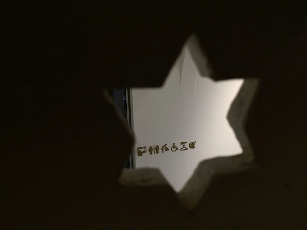 A glimpse through one of the many stars on the staircase