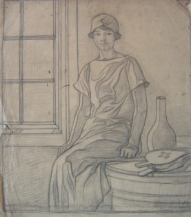 Kvinde siddende på et bord